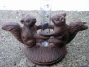 SQUIRREL RAIN MEASURE GAUGE CAST IRON