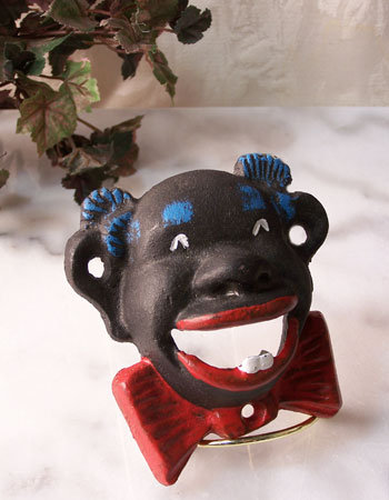 BLACK AMERICANA BOTTLE OPENER CAST IRON