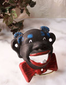 BLACK AMERICANA BOTTLE OPENER CAST IRON