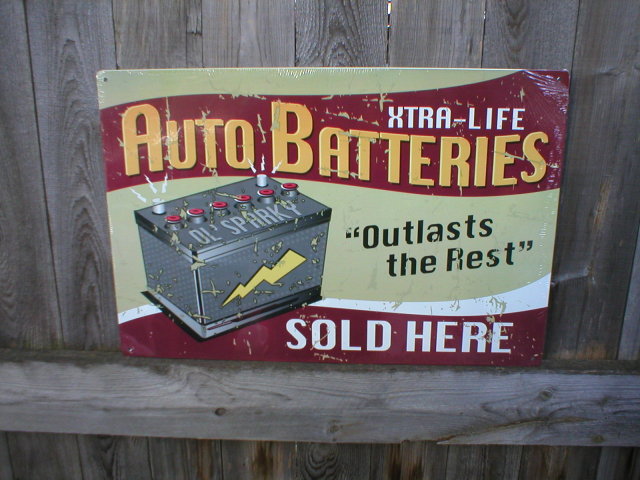 AUTO BATTERIES SOLD HERE TIN SIGN