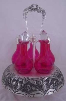 CRUET SET 5 CRANBERRY GLASS BOTTLES