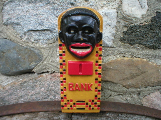 BLACK AMERICANA STILL BANK CAST IRON
