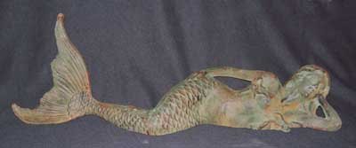 One Big Rustic Brown Laying Mermaid cast iron