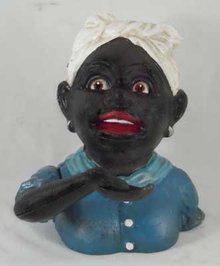 BLACK AMERICANA GIRL CAST IRON MECHANICAL BANK