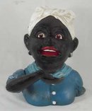 BLACK AMERICANA GIRL CAST IRON MECHANICAL BANK