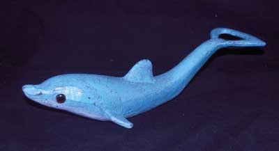 DOLPHIN BOTTLE OPENER GLASS EYES CAST IRON