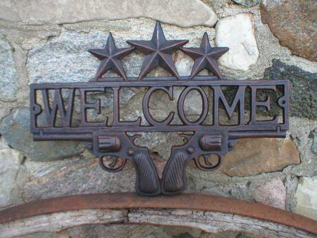 CAST IRON WESTERN WELCOME SIGN STARS PISTOLS