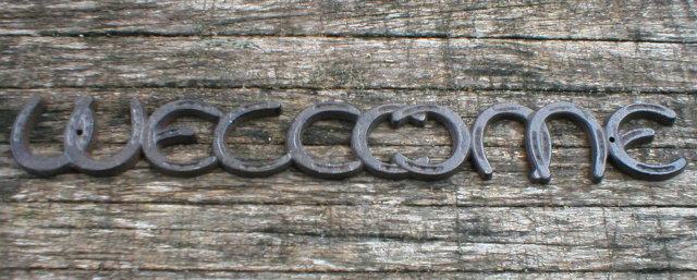 HORSESHOE WELCOME SIGN CAST IRON
