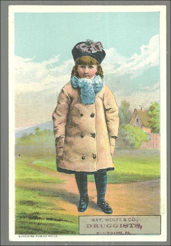 Victorian Trade Card for Nat. Wolfe & Co. , Druggists Little Girl Dressed Winter