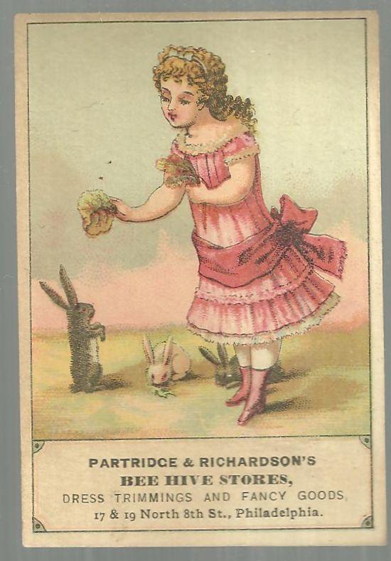 Victorian Trade Card Patridge and Richardson's Bee Hive Stores Girl with Bunnies