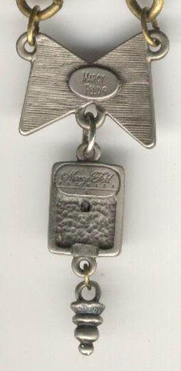 Marcy Feld Metal Necklace Bow and Leaf Charm