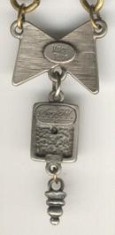 Marcy Feld Metal Necklace Bow and Leaf Charm