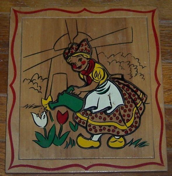 Wooden Frame Tray Puzzle With Little Dutch Girl Watering Tulips