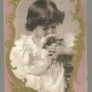 Victorian Trade Card For Woolson Spice Co with Beautiful Girl Sniffing Flowers