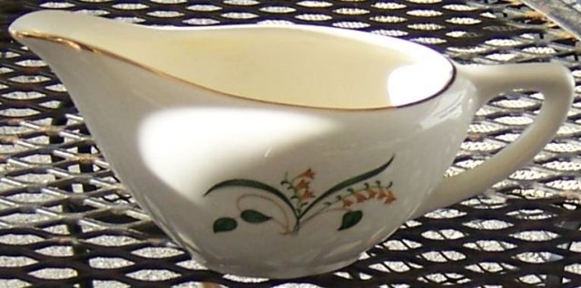 Retro Pottery Creamer with Floral Design