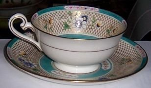 Royal Doulton Gold and Floral Cup and Saucer