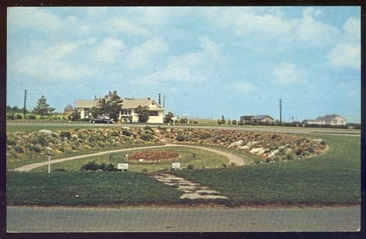 Postcard of Sunken Garden and Rockery Park Trans Canada Highway