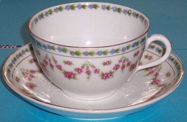 Set of Four Bassett Limoges, Austria Cups and Saucers