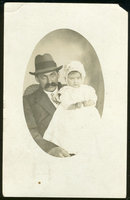 Real Photo Postcard of James Holding the Baby 1912