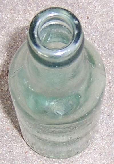 Vintage Massillon, Ohio Liquid Product Green 7oz Bottle