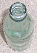 Vintage Massillon, Ohio Liquid Product Green 7oz Bottle