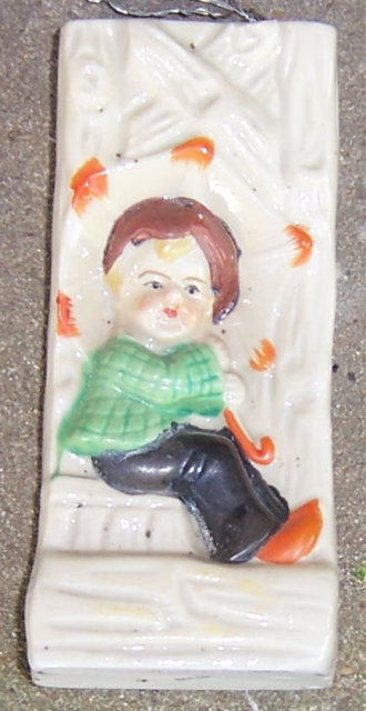 Vintage Pottery Little Boy with Umbrella Wall Pocket