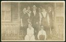 Real Photo Postcard of Large Family Standing on Porch