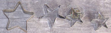 Vintage Set of Four Star Tin Cookie Cutters