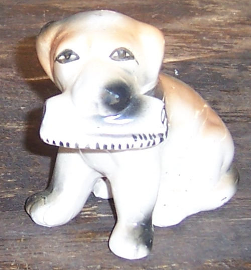 Vintage Pottery Dog Figurine with Newspaper in Mouth