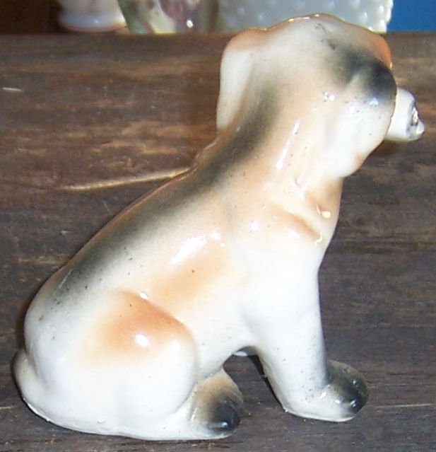 Vintage Pottery Dog Figurine with Newspaper in Mouth