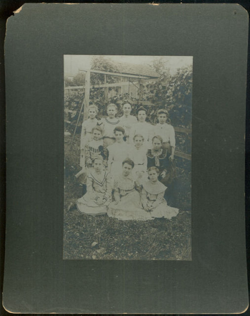 Framed Photograph of Group of Young Girls and Teacher
