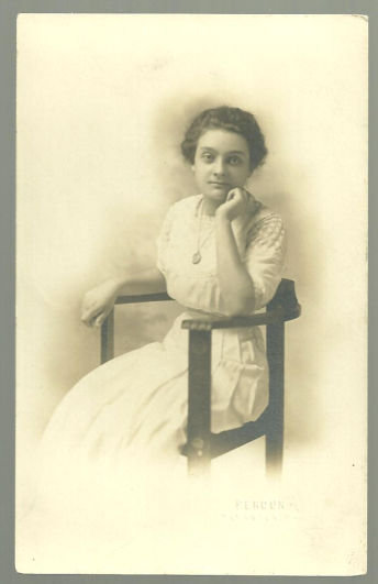 Real Photo Postcard of Lovely Lady Sitting in Chair