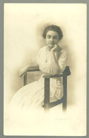 Real Photo Postcard of Lovely Lady Sitting in Chair