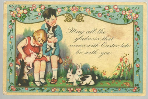 Easter Card with a Boy and Girl Playing with Bunnies