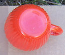 Vintage Orange Fired on Glass Creamer