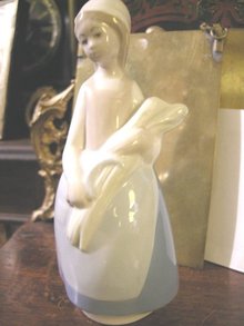 Rex by Lladro Girl with Bundle