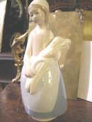 Rex by Lladro Girl with Bundle