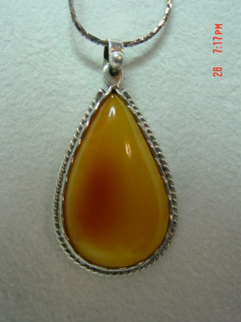 Tear Drop Shaped Honey Amber Sterling Pendant