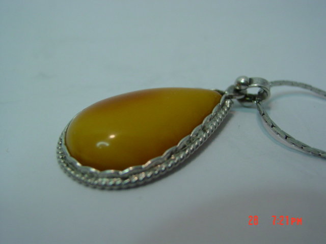 Tear Drop Shaped Honey Amber Sterling Pendant
