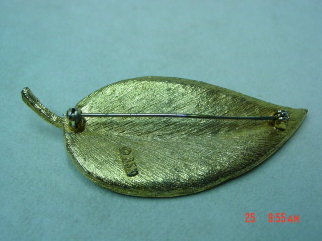 BSK Goldtone Leaf Brooch with Leather Look