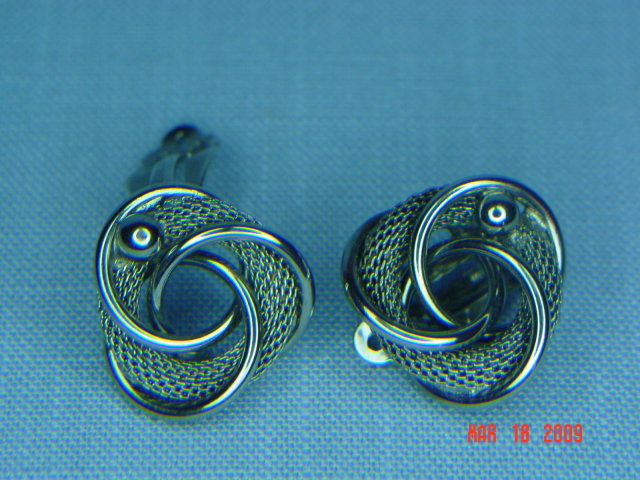 Carnegie Silvertone Clip Earrings