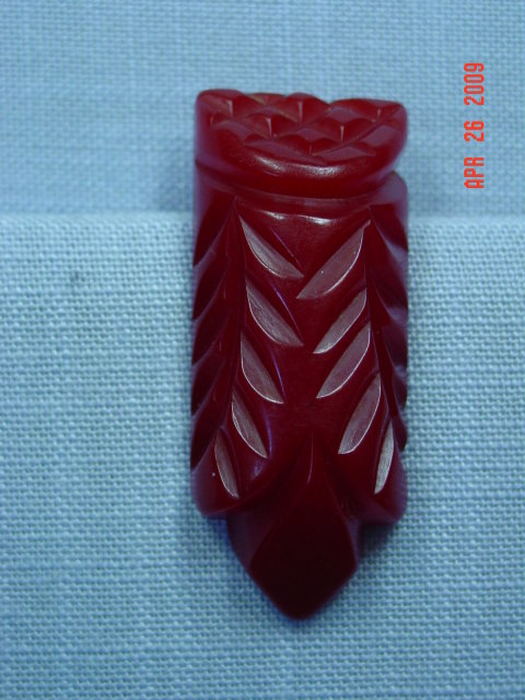 Carved Red Bakelite Dress Clip