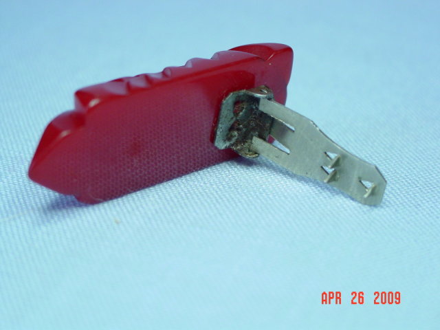 Carved Red Bakelite Dress Clip