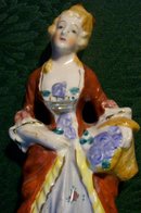 Colonial Lady with Basket Ceramic Figurine Japan 1930s-40s 8.25