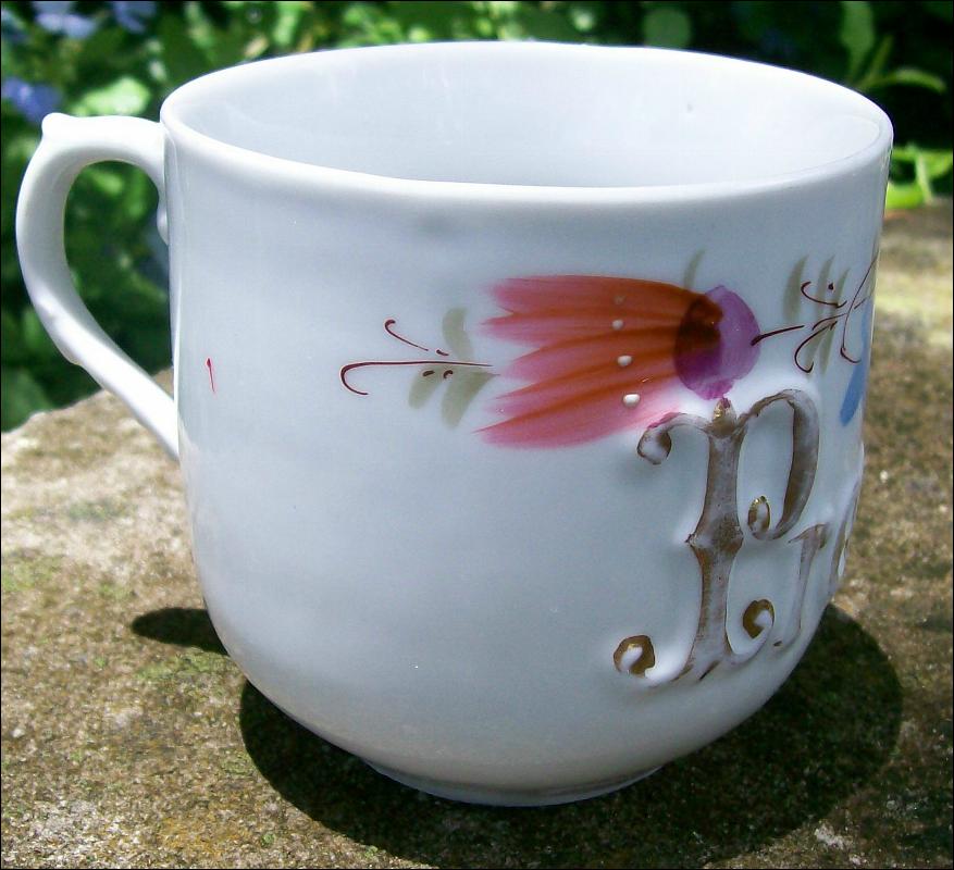 German Porcelain Mug Embossed