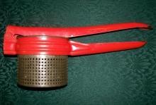 Kitchen Ricer with Red Handle: Handy Things