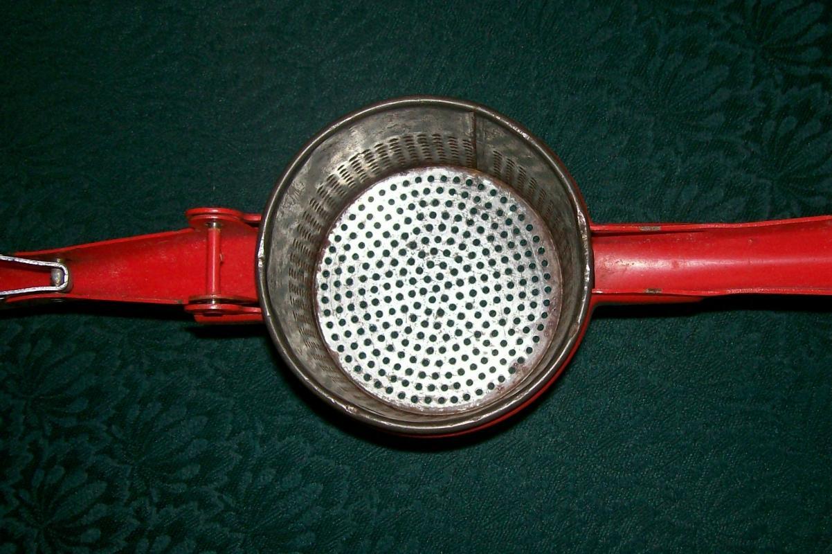 Kitchen Ricer with Red Handle: Handy Things
