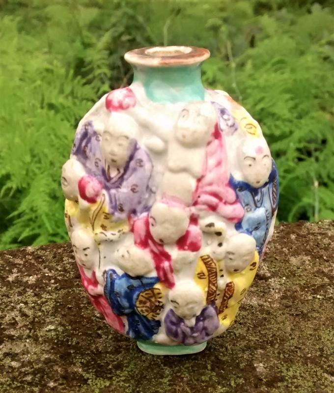 Chinese Porcelain Snuff Bottle Molded in Relief 18 Lohan Ca. 1900