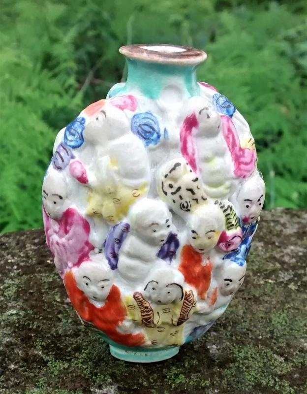 Chinese Porcelain Snuff Bottle Molded in Relief 18 Lohan Ca. 1900