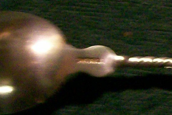 Sterling Spoon: Engraved Roses & Twisted Stem